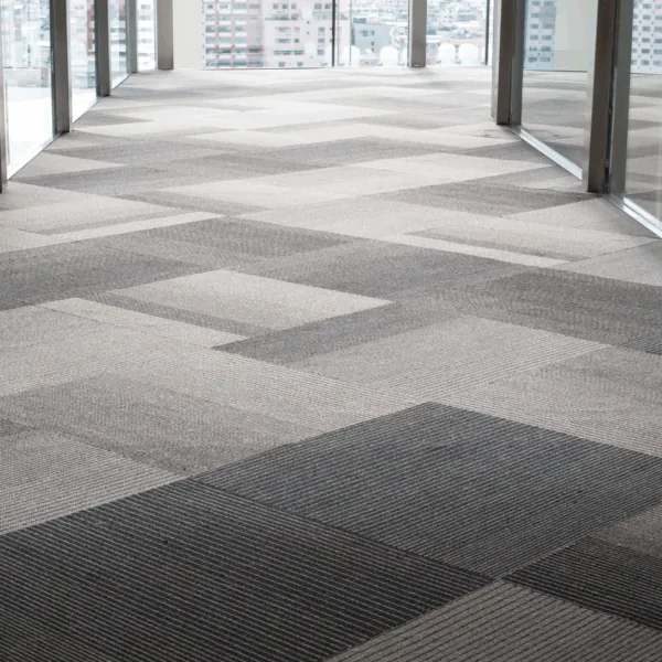Why The Space Coast property owners choose carpet tile over broadloom