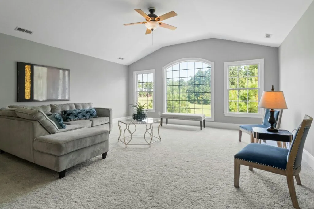 Modern living room with wide-plank hardwood flooring